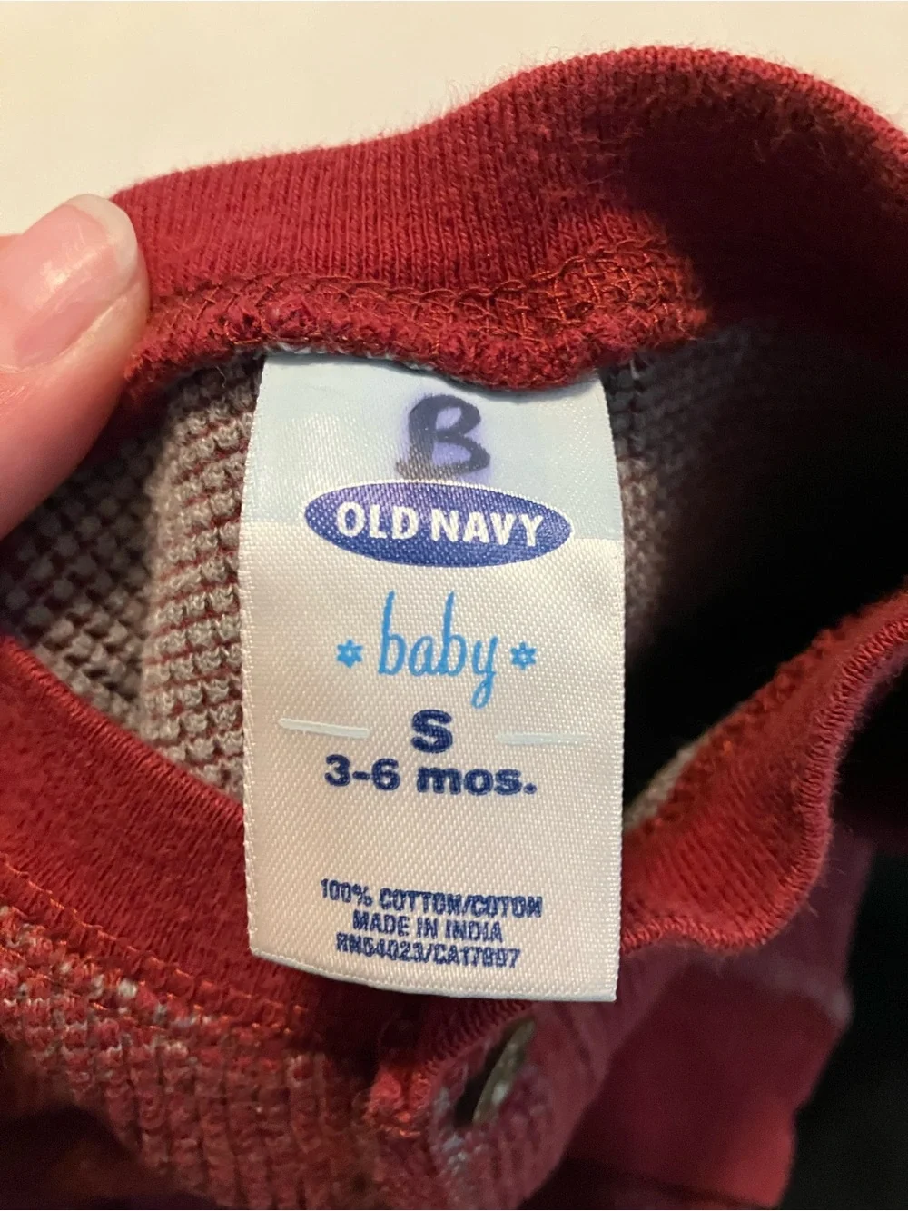 Red Baby Henley Bodysuit and Black Pants